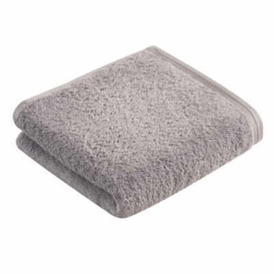 opgevouwen effen grijze handdoek - luxe handdoeken