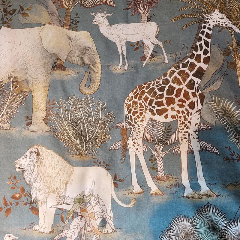 olifant, antilope, giraffe en leeuw op een dekbedovertrek