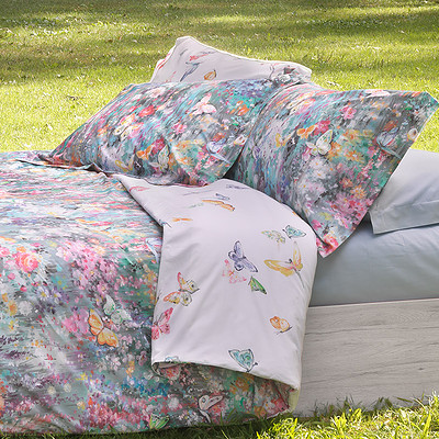 omkeerbaar dekbedovertrek aquarel print pastel kleuren in bloemen en vlinders